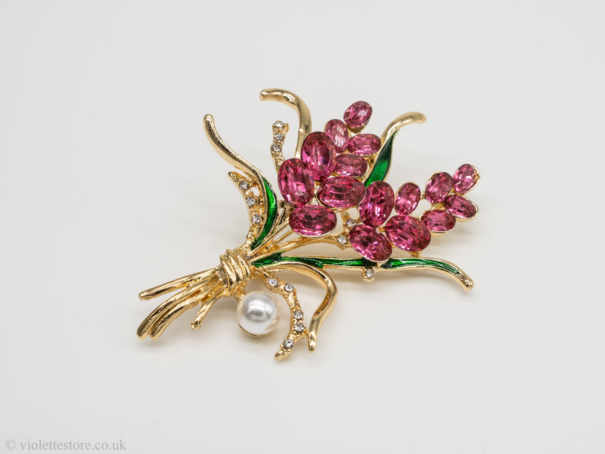 red crystal lady brooches